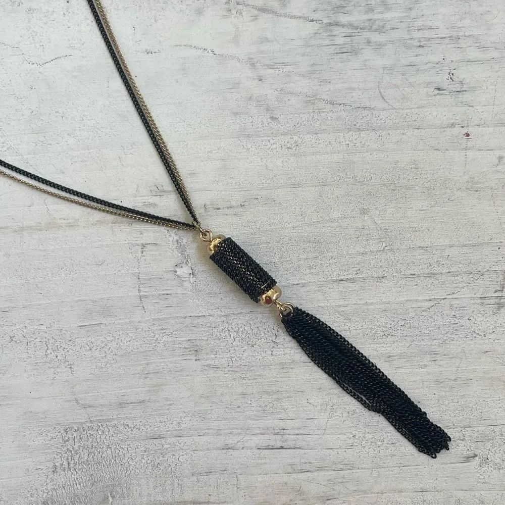 Charming Charlie black and gold tone tassel necklace